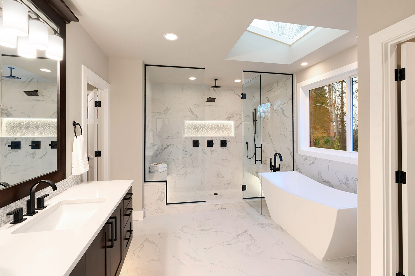 Vanity with quartz countertop and sconces